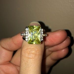 Lime green and silver diamond ring